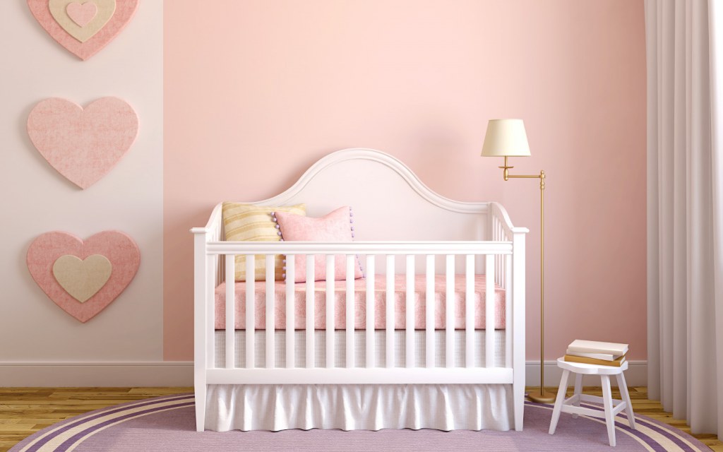 Hues of pink and white are perfect for a baby girl's nursery