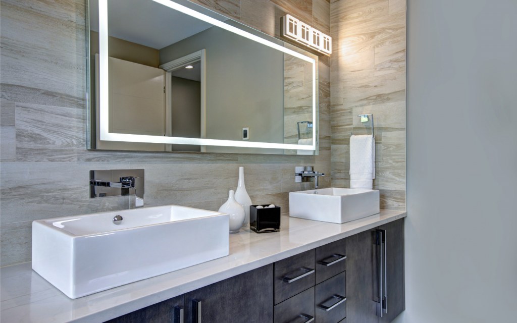 try installing wide vanity mirrors in your bathroom