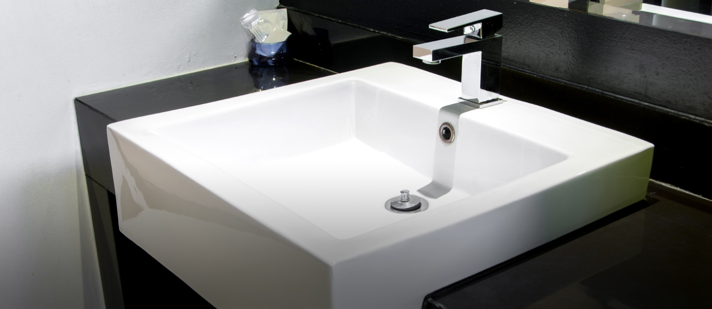 most common material for drop in bathroom sinks