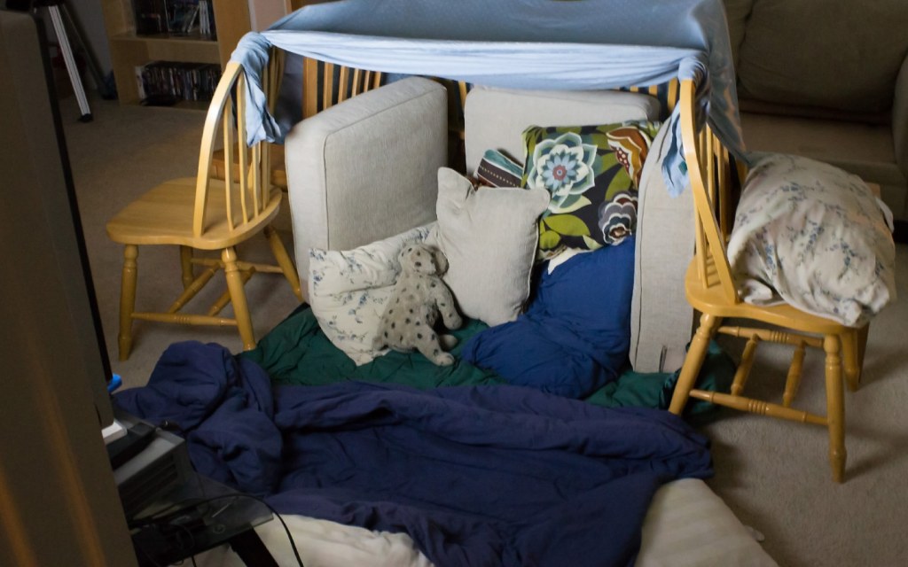 Indoor activities for the winter include building a fort indoors